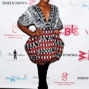 Dawn Richard in deola sagoe african print bubble dress and knee high boots